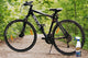 Mountain bike on a forest trail with 361 All Purpose Cleaner bottle in front—part of Sisbrill’s bike cleaning products for a spotless, trail-ready ride.